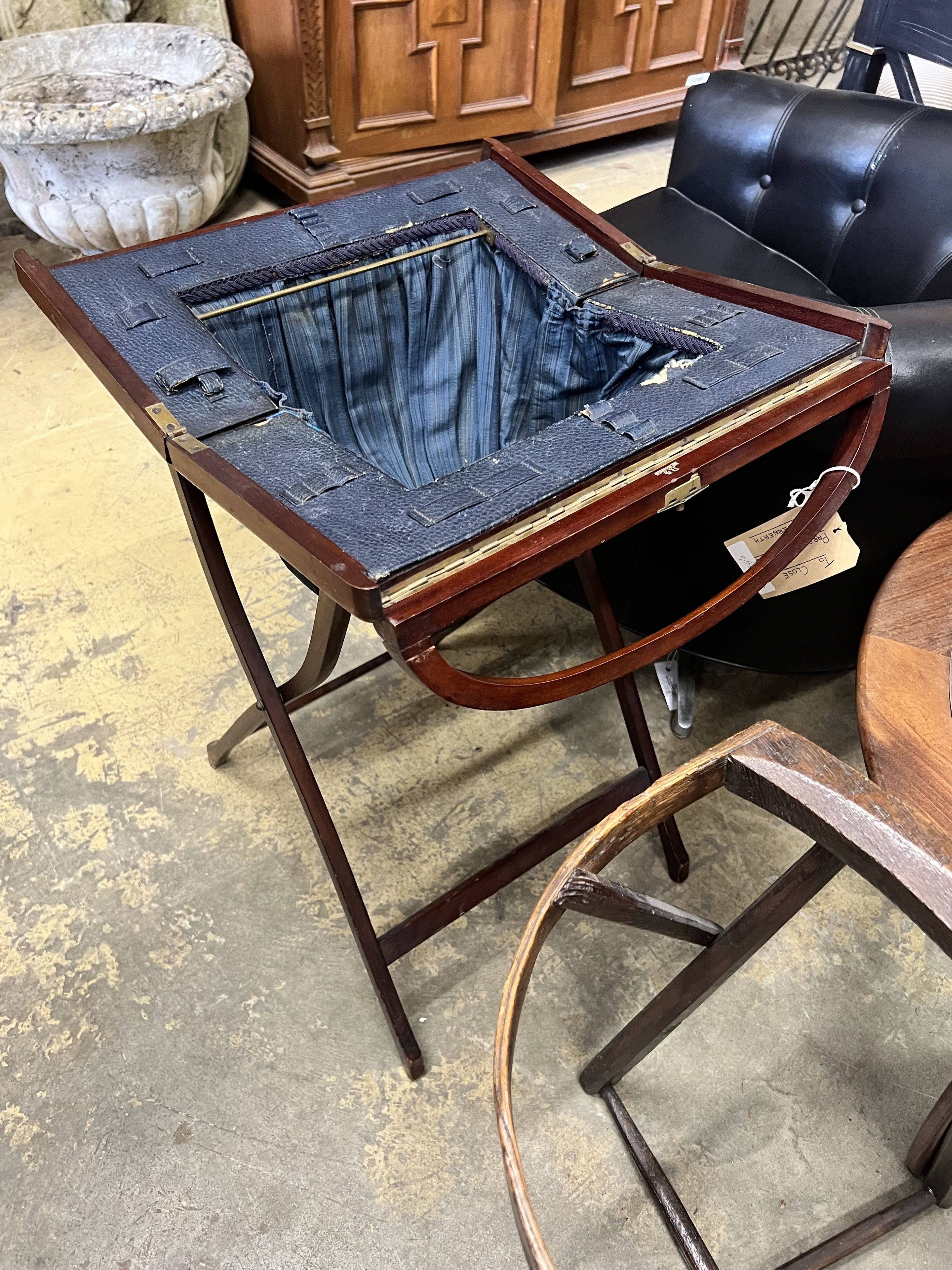 A lace pillow bolster stand, a mahogany work box on folding stand and a lacemaker's pillow stand